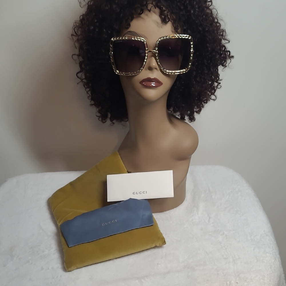 Gucci Women's Sunglasses with Gold Frame and Black Accents